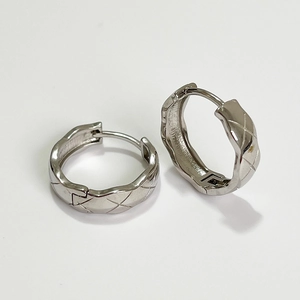 Minimalist 925 sterling silver geometric quilted pattern hoop earrings on white background