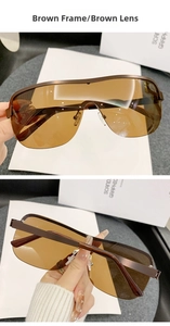 Detail view of brown semi-rimless cycling sunglasses with integrated shield lens and nose pads