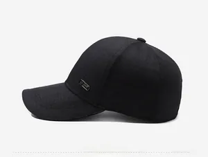 Side view of black baseball cap for men featuring a metallic rectangle logo detail