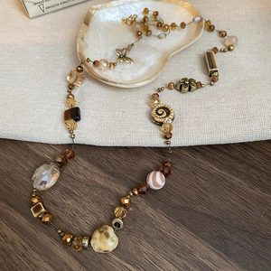 Bohemian brown ceramic bead long necklace with geometric vintage accents and charms