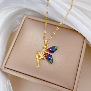 Titanium steel necklace with crystal fairy wing pendant on beige jewelry box display
