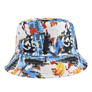Detailed view of colorful graffiti newspaper print on white canvas bucket hat fabric