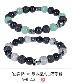Detail of 8mm green crystal and volcanic stone beaded bracelets with elastic cord
