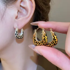 U-shaped leopard print chunky hoop earrings in gold and silver finish for women