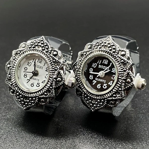 Vintage silver quartz ring watches with engraved bezels in white and black dials