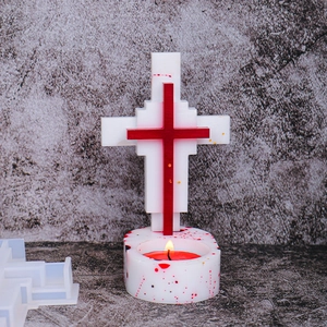 Detail of cross candle holder DIY set with silicone mold and blood splat effect