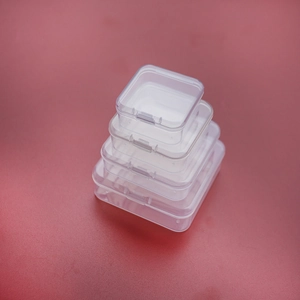 Macro shot of four transparent PP storage boxes in various sizes with secure buckle lids