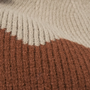 Women's warm knit beanie with chunky rib texture and stylish two-tone color block design