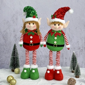Close-up of plush Christmas elf dolls with sequin hats and striped telescopic long legs