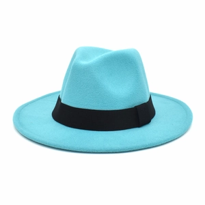 Detail of turquoise wool fedora hat with a premium black ribbon band on a white background