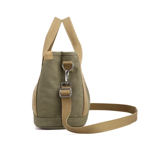 Army green washed canvas tote bag with thick adjustable shoulder strap and khaki handles