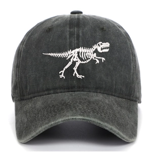 Close-up of dinosaur skeleton embroidery on washed dark grey cotton baseball cap