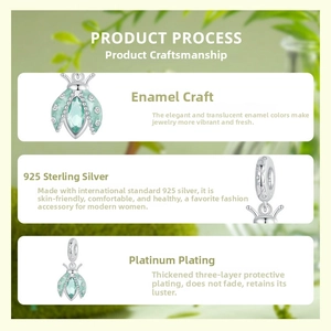 Macro view of 925 sterling silver insect charm with green enamel and plating details