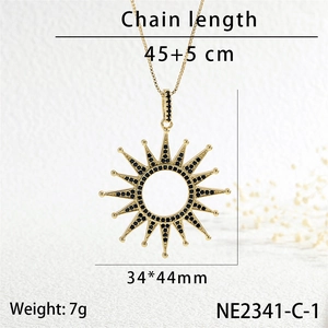 Detailed view of sunburst pendant with black cubic zirconia and size specifications