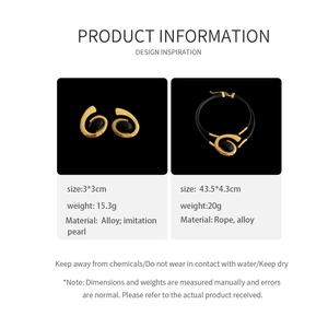 Detailed specs of vintage oval spiral jewelry set with earrings and black cord necklace