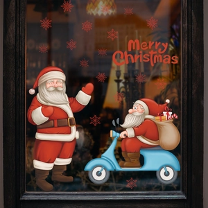 Christmas window decals with Santa Claus on scooter and Merry Christmas text decor