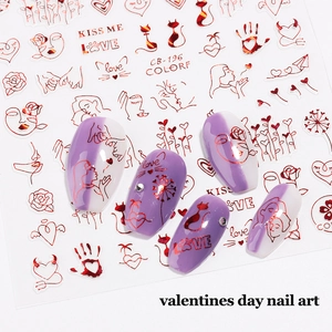 3D heart and rose nail art stickers for Valentine's Day on purple gradient nails