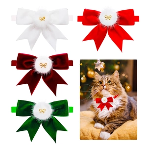 Velvet pet bow ties in red and green with faux fur pom and adjustable strap detail