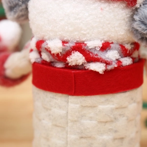 Plush Christmas apple gift box with soft white fleece and red knitted scarf decor
