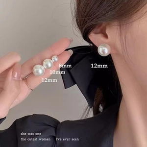 Detail view of 925 silver needle pearl earrings in 8mm, 10mm and 12mm sizes