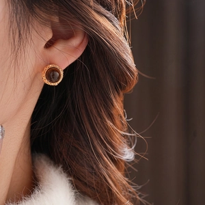 Vintage round tiger eye stone stud earrings with intricate gold textured frames for women
