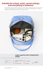 Interior view of blue nylon crossbody bag showing compartments for umbrella and phone