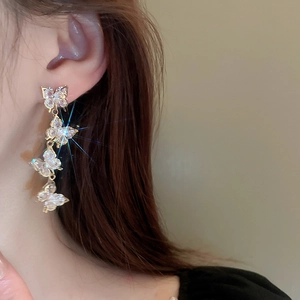 Sparkling zircon butterfly long tassel earrings in gold finish for elegant women