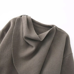 Brown asymmetric knit cape shawl with a draped scarf collar and fine ribbed texture