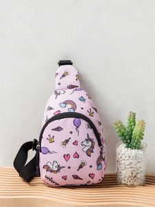 Detailed view of pink crossbody bag featuring colorful unicorn and rainbow cartoon patterns