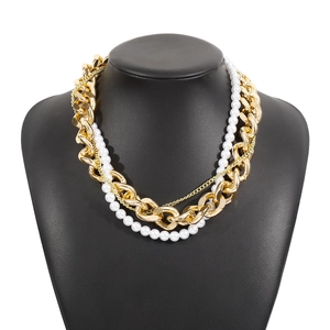 Vintage gold chunky chain and white pearl layered necklace set for a luxury metal look