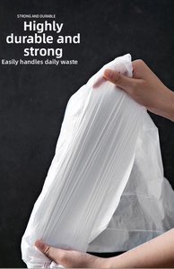 Close-up of durable white drawstring trash bag showing strong elasticity and high toughness