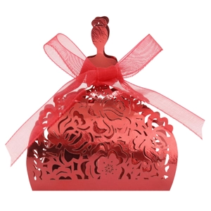 Elegant red laser-cut dress-shaped candy favor box with intricate floral pattern and ribbon