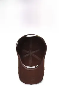 Internal structure of vintage brown baseball cap with breathable seams and washing label
