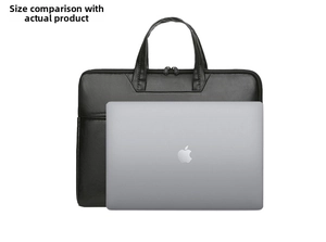 Size comparison of large black laptop briefcase with a 13-14 inch notebook computer
