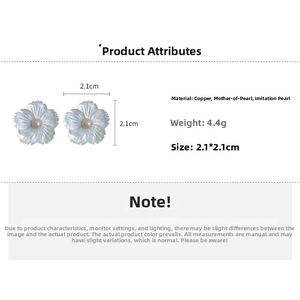 Detail of shell flower stud earrings with pearl center including size and weight specs