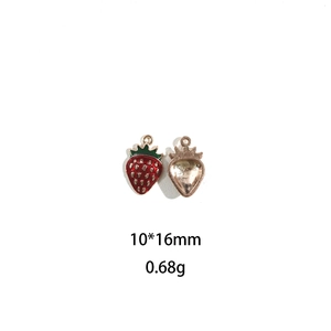 Detail view of 10*16mm red strawberry alloy pendant with gold plating and hollow back