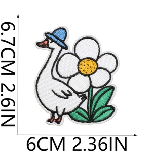 Embroidered white goose patch with blue hat and daisy flower showing dimensions