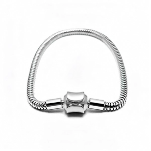 Classic silver stainless steel snake bone chain bracelet with barrel clasp on white background