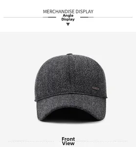 Detail view of winter baseball cap showing thick gray wool texture and leather side label