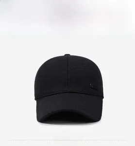 Detailed front view of black winter baseball cap featuring a metal SPORT side emblem