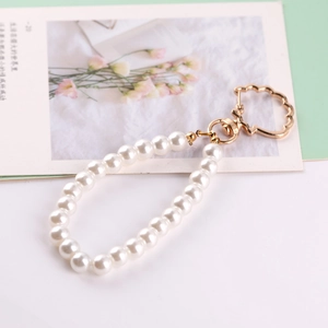 White glass pearl beaded phone strap with gold cloud charm and lobster clasp key chain
