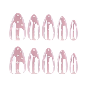 Faux ongles amande courts roses à pois blancs avec une finition ultra brillante