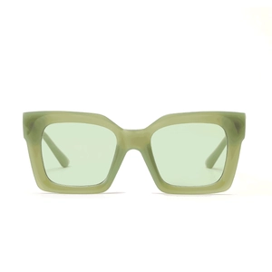 Detail view of square frame sunglasses in Morandi green finish with durable plastic texture