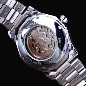 Macro shot of stainless steel back showing transparent skeleton movement and engravings