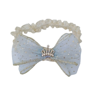 Lace baby headband with light blue sequin bow and rhinestone crown on white background