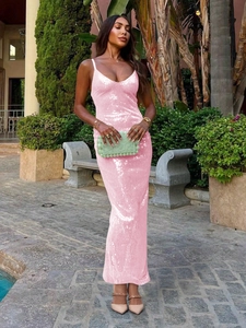 Detail of pink sequin evening dress with a slim fit cut and elegant backless design