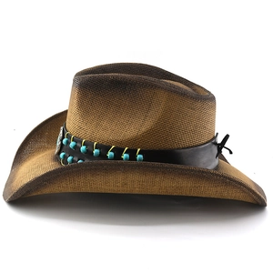 Detail of western straw hat featuring turquoise beads and dark brown leather band