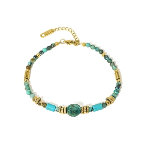 Bohemian African turquoise beaded bracelet with golden stainless steel charms and lobster clasp