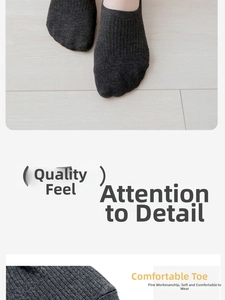 Detailed macro view of dark grey cotton low-cut socks showing reinforced toe and rib knit