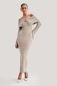 Detail of elegant oatmeal knit maxi dress with off-shoulder neckline and metal buckle